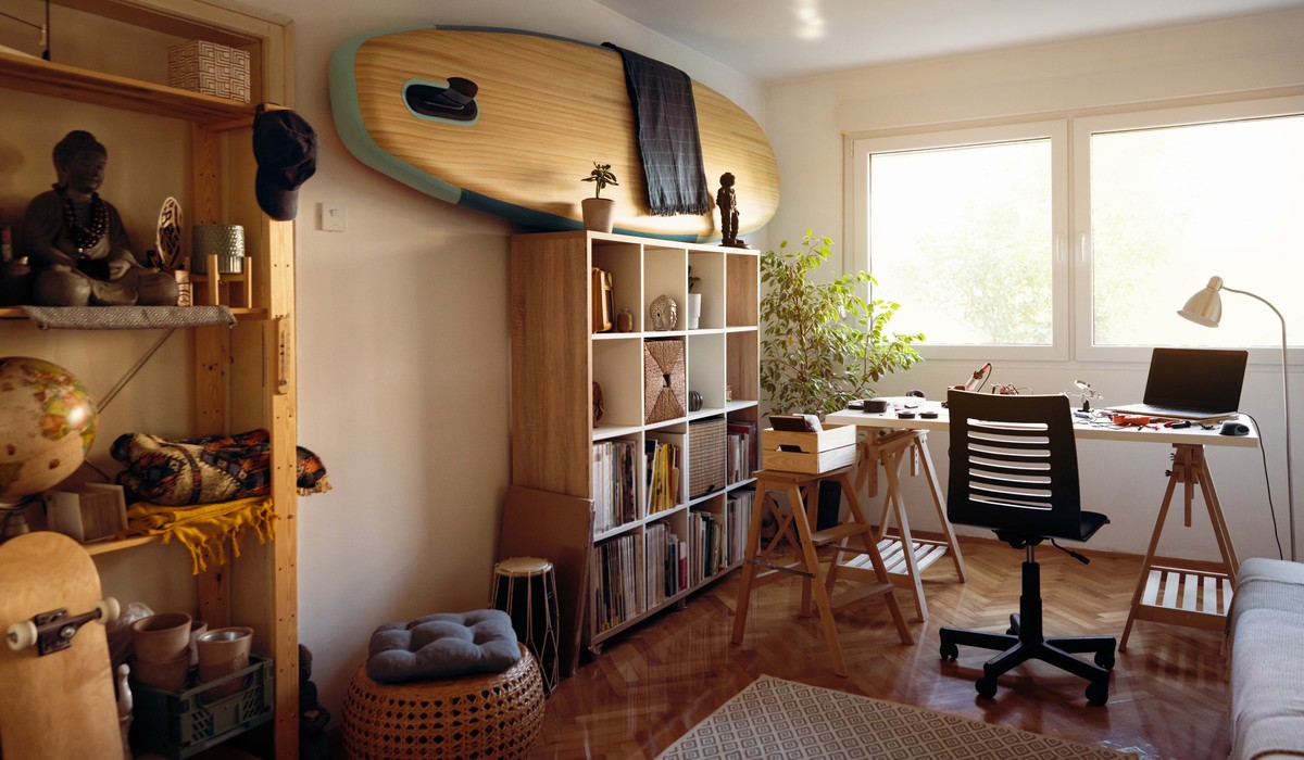 Modern and nicely arranged workspace, of a robotic engineer and programmer, with all the tools, and robotic car in the making