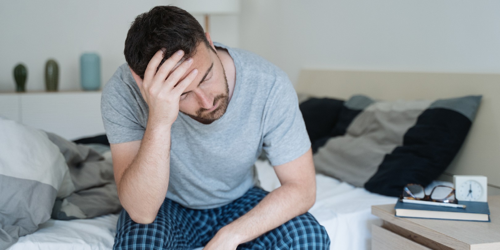 Man with sleeping problem wake up feeling tiredness