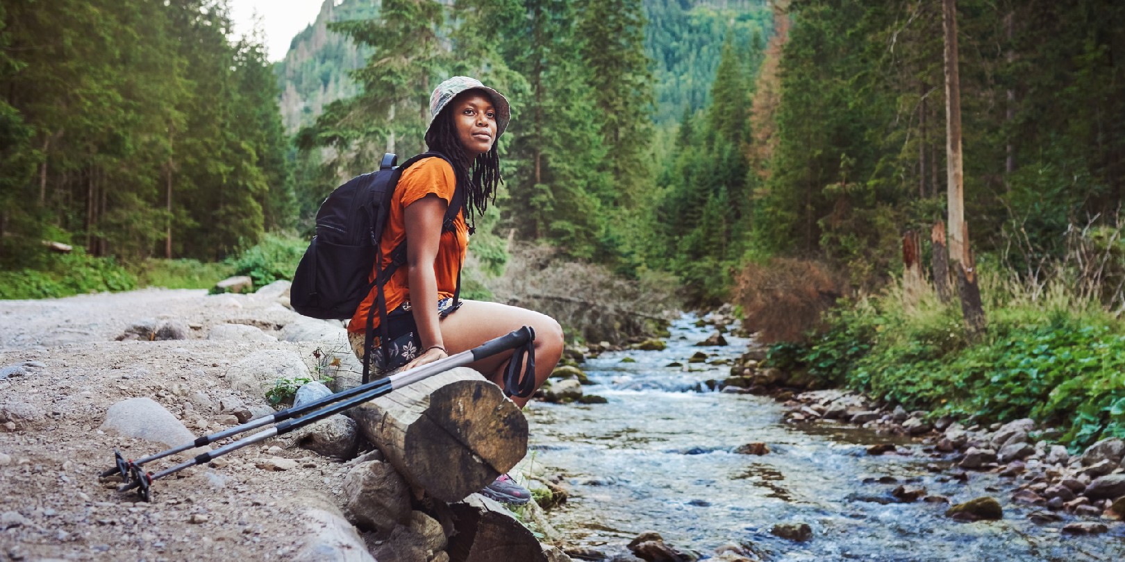 Shot of a young attractive woman hiking in nature